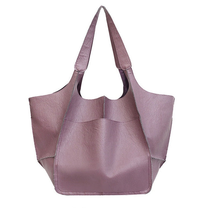 Frontansicht der eleganten Damen Handtasche aus veganem Leder, mit stilvollen Details & weicher Textur.