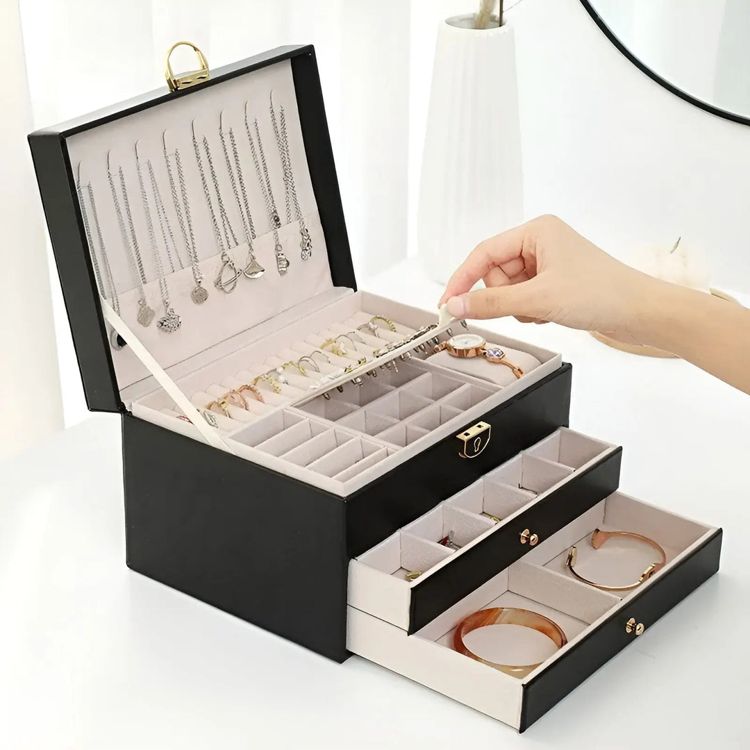 Elegante Damen Schmuckbox aus PU-Leder, mehrschichtig & organisiert für Ringe, Ketten, Ohrringe.
