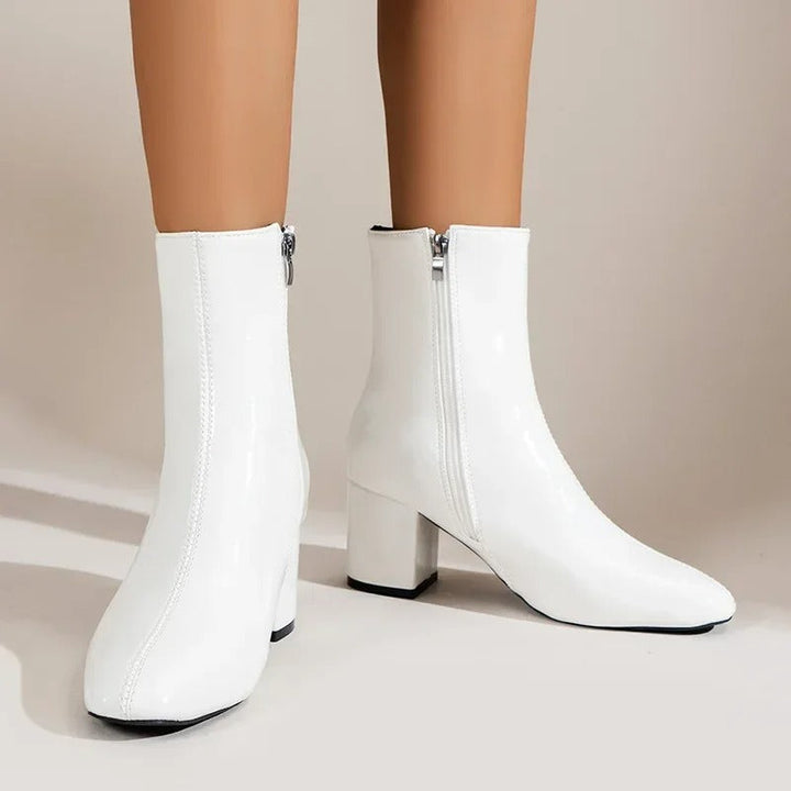 Elegante Damen Stiefeletten mit bequemem Blockabsatz & spitzer Zehenform. Perfekt für Herbst, Winter, Büro & Freizeit.