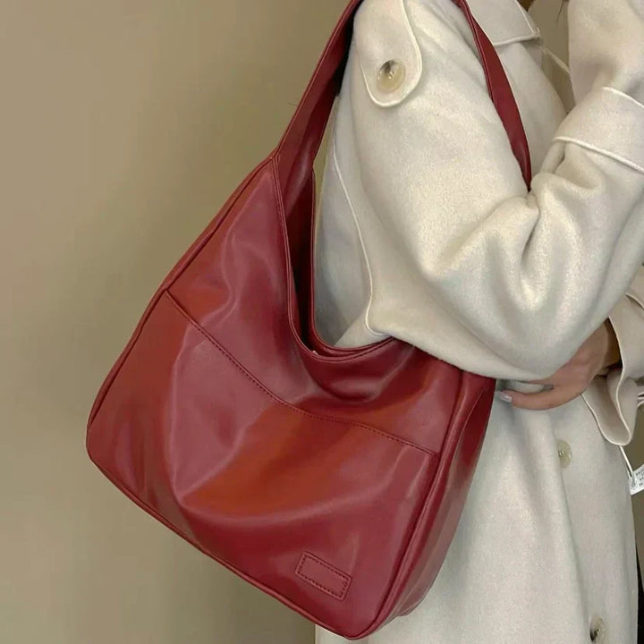 Praktische Damen Alltagstasche mit großer Kapazität. Stilvolle Umhängetasche in modernem Design.