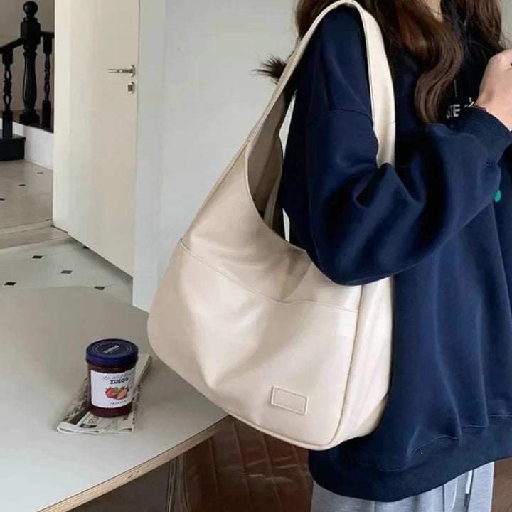 Edle weiße Damen Umhängetasche, ein stilvolles Accessoire. Ideal für Büro oder Freizeit.