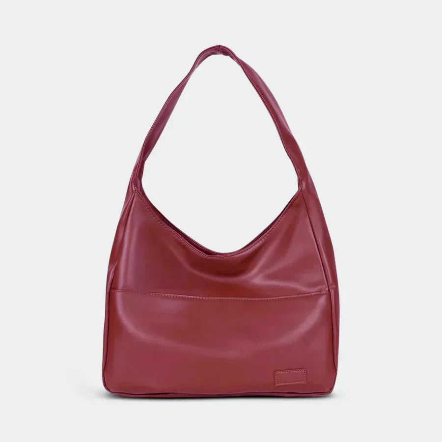 Feminine Damen Modetasche, bequem als Schultertasche tragbar. Zeitloses Design für stilbewusste Frauen.