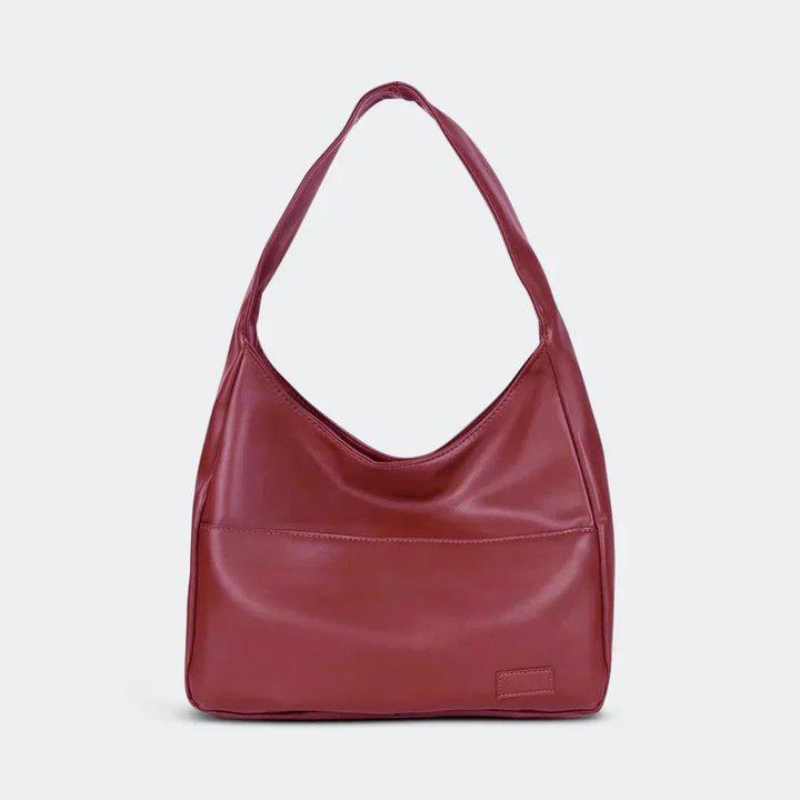 Feminine Damen Modetasche, bequem als Schultertasche tragbar. Zeitloses Design für stilbewusste Frauen.