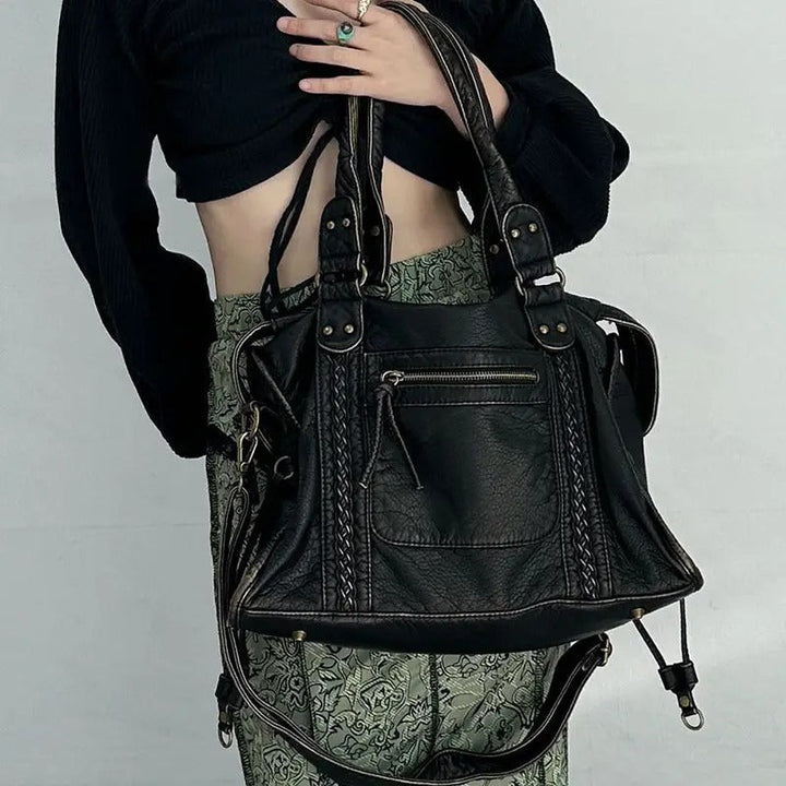 Klassische Vintage Leder Handtasche für Damen, Modell Marisol, Vorderansicht mit elegantem Verschluss.