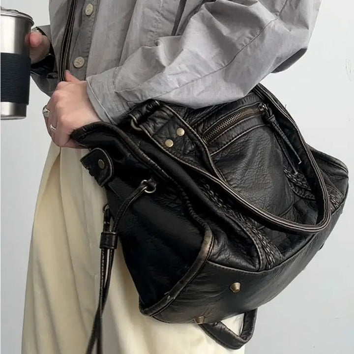 Modisches Damenaccessoire: Vintage Leder Handtasche Marisol, klassisch-elegant, vielseitig kombinierbar.