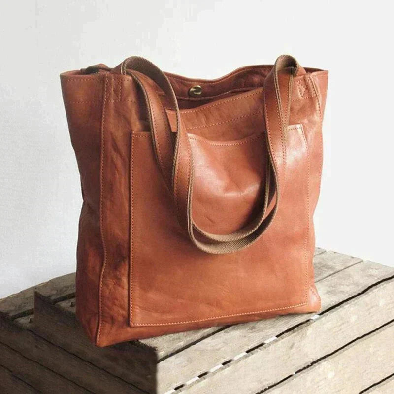 Elegante Damenhandtasche aus braunem Leder, zeitlos und klassisch, perfekt für Alltag und besondere Anlässe.