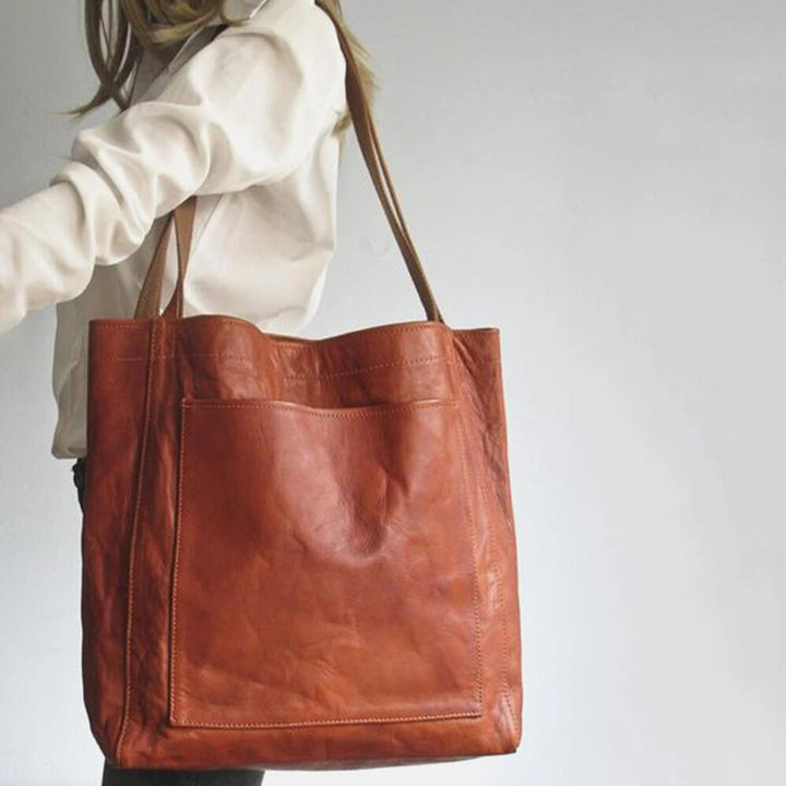 Braune Damenhandtasche mit viel Platz für Organisation, schick und praktisch, perfekt für Beruf und Freizeit.