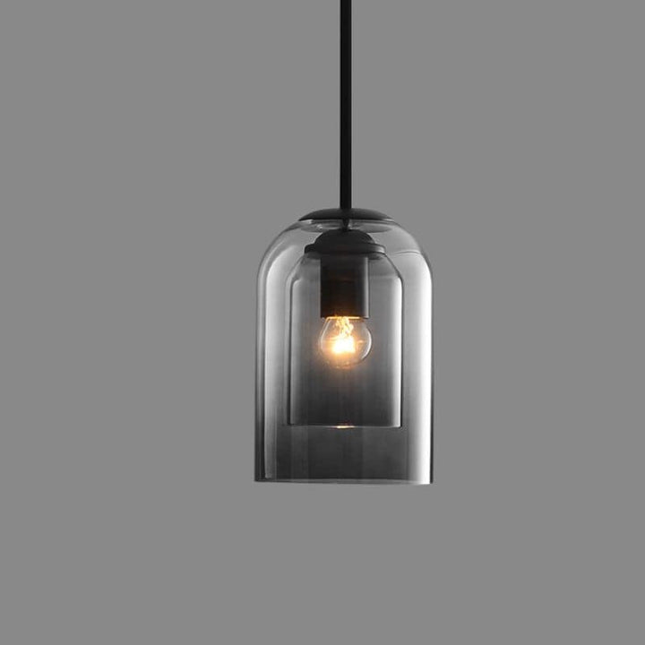 Moderne Doppelglas-Pendelleuchte in Rauchgrau & Rost. Stilvolle Hängeleuchte für zeitgemäße Innenbeleuchtung.