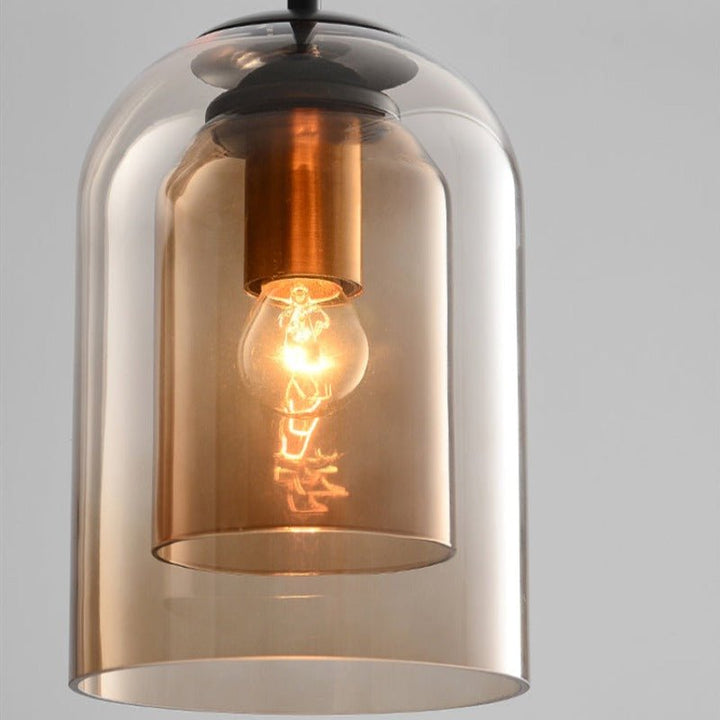 Elegante Pendelleuchte mit Doppelglas, rauchgrau & rostfarben. Perfekt als moderne Wohnzimmer-Beleuchtung.