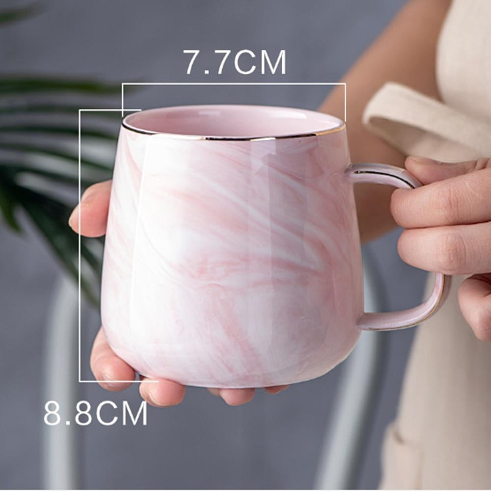 Moderne Designtasse in Marmoroptik (Grau/Rosa) mit Goldrand. Ideal für Kaffee, Tee, als Luxus-Geschenk.