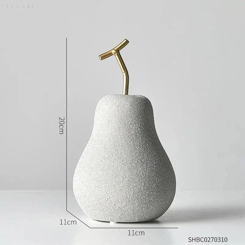 Glänzende Harz-Skulptur: minimalistische Apfel-Deko, goldfarben, perfekt als stilvolle Tischdekoration.