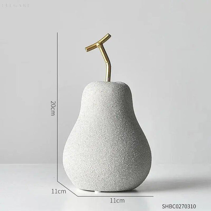 Glänzende Harz-Skulptur: minimalistische Apfel-Deko, goldfarben, perfekt als stilvolle Tischdekoration.