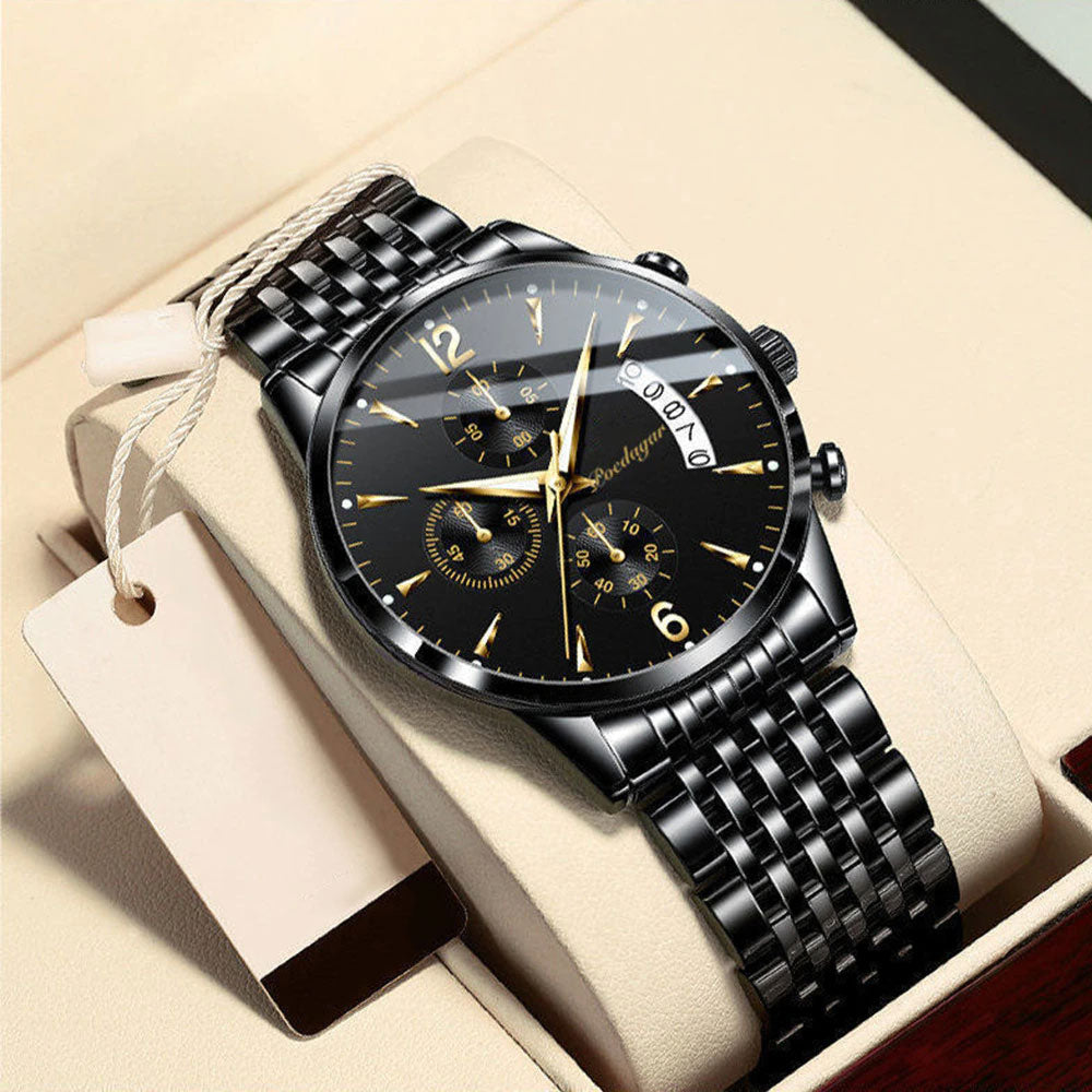 Gold-silberne Herren Stahlarmbanduhr mit blauem Zifferblatt. Elegantes Quarzwerk, wasserdicht und Saphirglas. Luxus Accessoire.