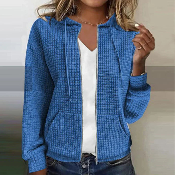 Moderne karierte Übergangsjacke für Damen, perfekt für Herbst und Frühling, bequem und vielseitig.