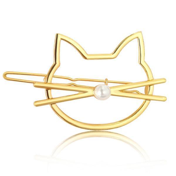 Elegante Katzenhaarspange für Damen mit schimmernder Perle, erhältlich in Gold und Silber. Perfekter Haarschmuck.
