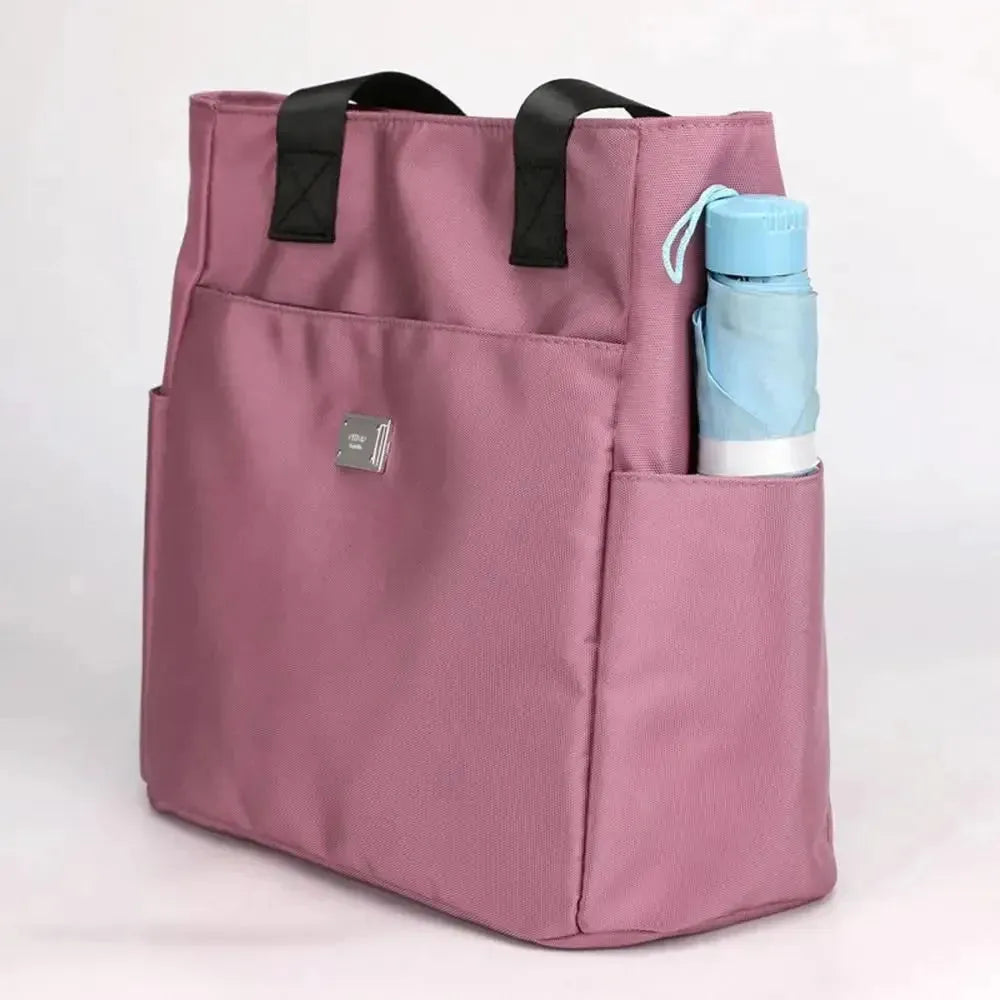 Vielseitige Damen-Reisetasche: leichte, wasserdichte Handtasche mit mehreren Fächern, ideal für unterwegs.