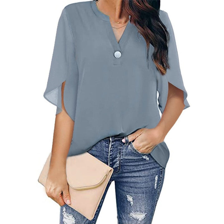 Diese elegante Damenbluse ist ein stilvolles Basic-Oberteil, das sich leicht für jeden Anlass anpassen lässt.