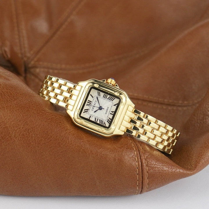 Elegante quadratische Damenuhr Arlette in Gold mit Quarzwerk, ein modisches Accessoire für Frauen.