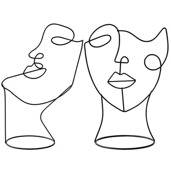 Modernes Statement-Stück: Abstrakte Einlinien-Gesichtsskulptur in Schwarz, ideal für ästhetisches Heimdesign.