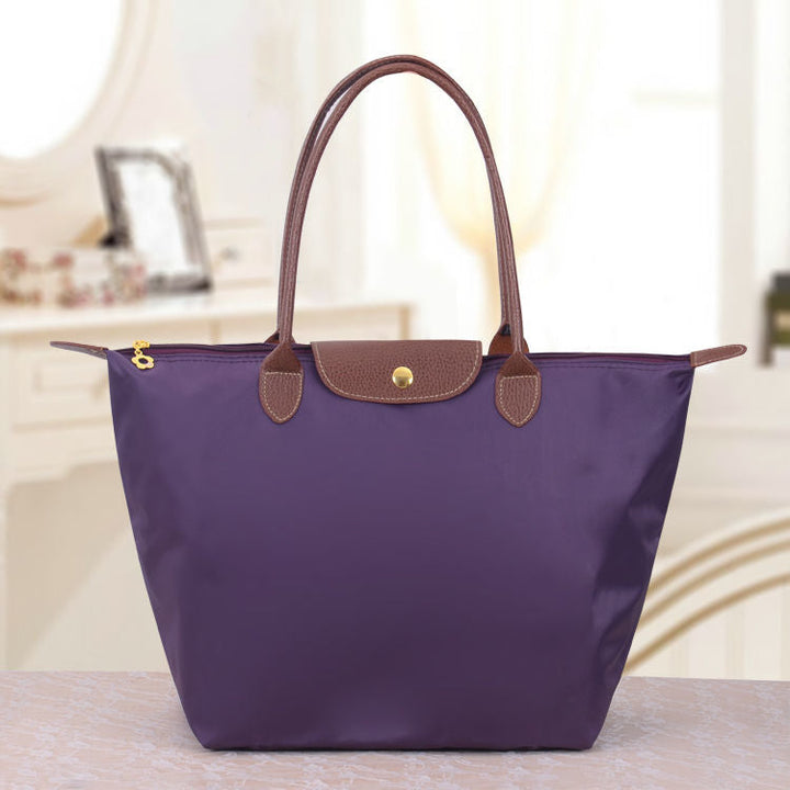 Ganzjährige Oxford Handtasche für Damen in Schwarz, ein zeitloses Mode-Accessoire mit Stil.