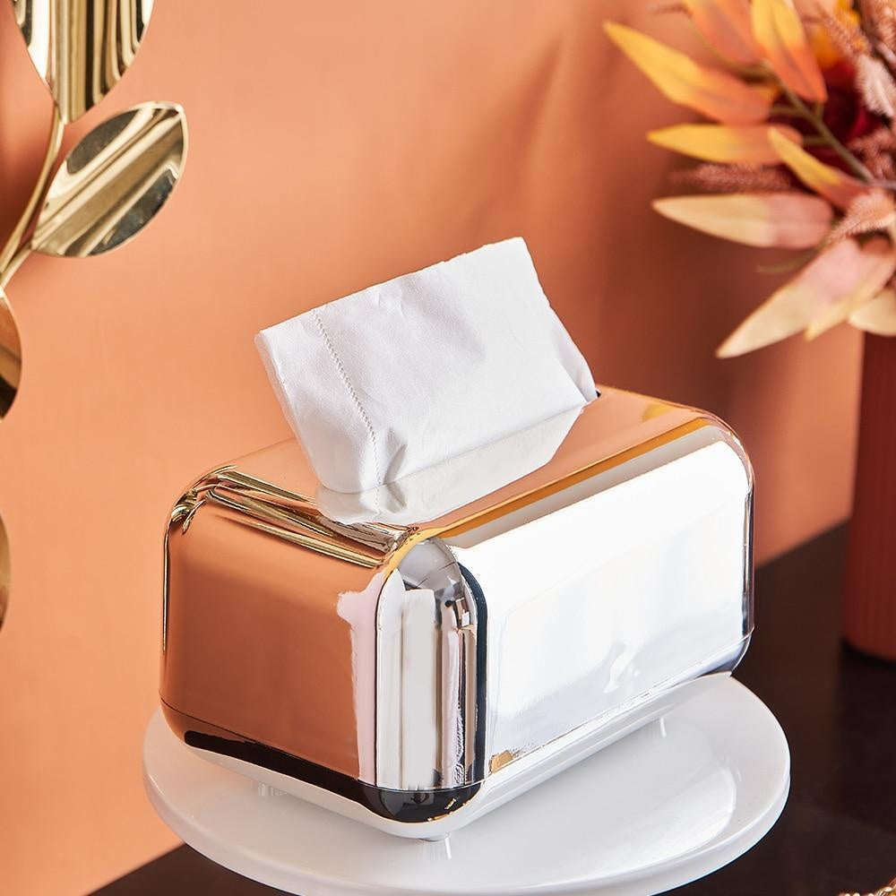 Goldene, elegante Taschentuchbox aus ABS-Kunststoff, stilvolles Wohnaccessoire.