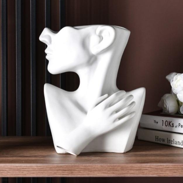 Moderne weiße Keramik Vase mit Blumen, ideal für florale Tischdekoration. Eine elegante Geschenkidee.