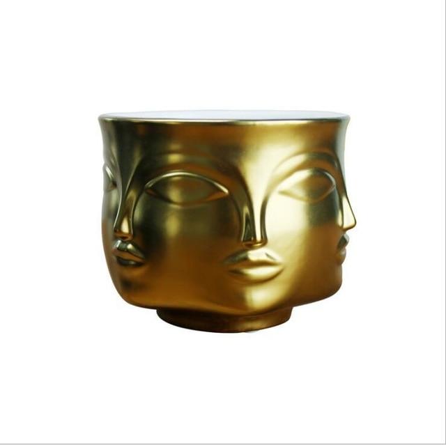 Kunstvolle Buddha Kopf Vase, ideal für anspruchsvolle Wohnzimmer Deko. Fügt Eleganz hinzu.