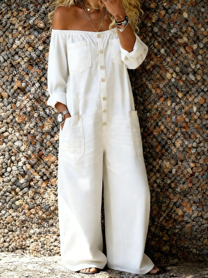 Damen Denim Jumpsuit mit Off-Shoulder-Ausschnitt. Trendiger Einteiler für einen coolen Casual-Look im Sommer.