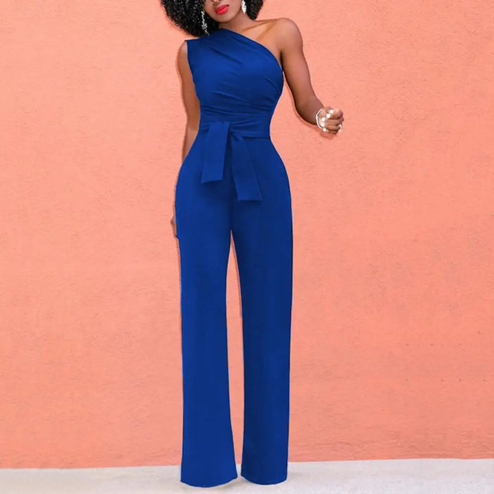 Vielseitiger Damen Einteiler Phoebe: Der elegante Jumpsuit mit einer Schulter ist ein modisches Statement.