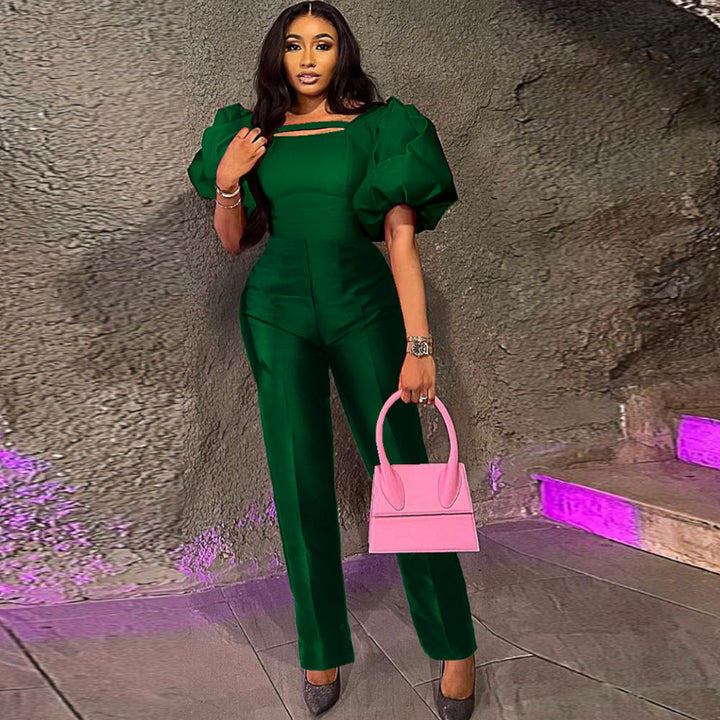 Eleganter Damen Jumpsuit mit stilvollen Puffärmeln und schmeichelhaft tailliertem Schnitt für festliche Anlässe.