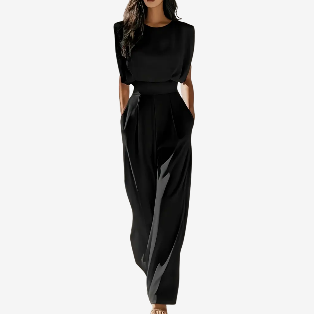 Modischer Damen Jumpsuit, figurbetont durch elegante Taillenschnürung. Bequemer Einteiler für den perfekten Look.