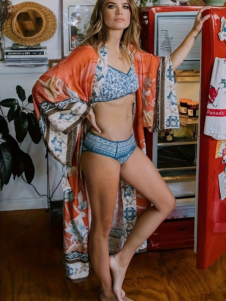 Modischer Damen Kimono mit lebendigem Blumenprint. Vielseitiger Strand-Überwurf & leichte Jacke für den Sommer.