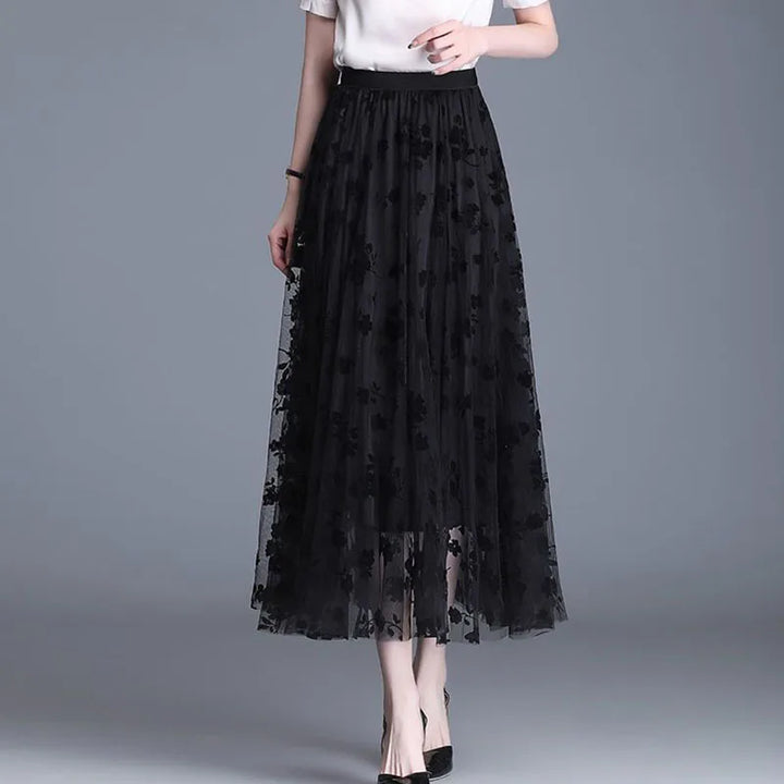 Stilvoller Damen Midi-Rock Fiona aus luftigem Mesh, ideal für Frühling & Sommer. Eleganter Freizeitrock für jede Frau.