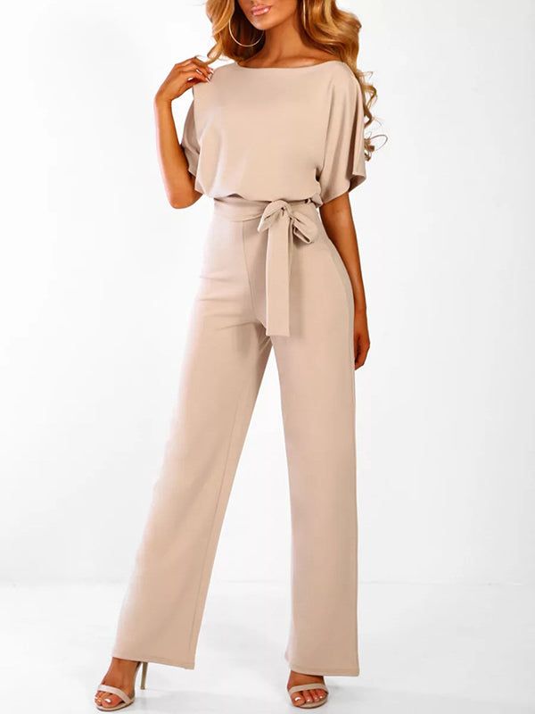 Rosa Damen Jumpsuit mit Rüschengürtel & kurzen Ärmeln, ideal für Sommer & formelle Anlässe.