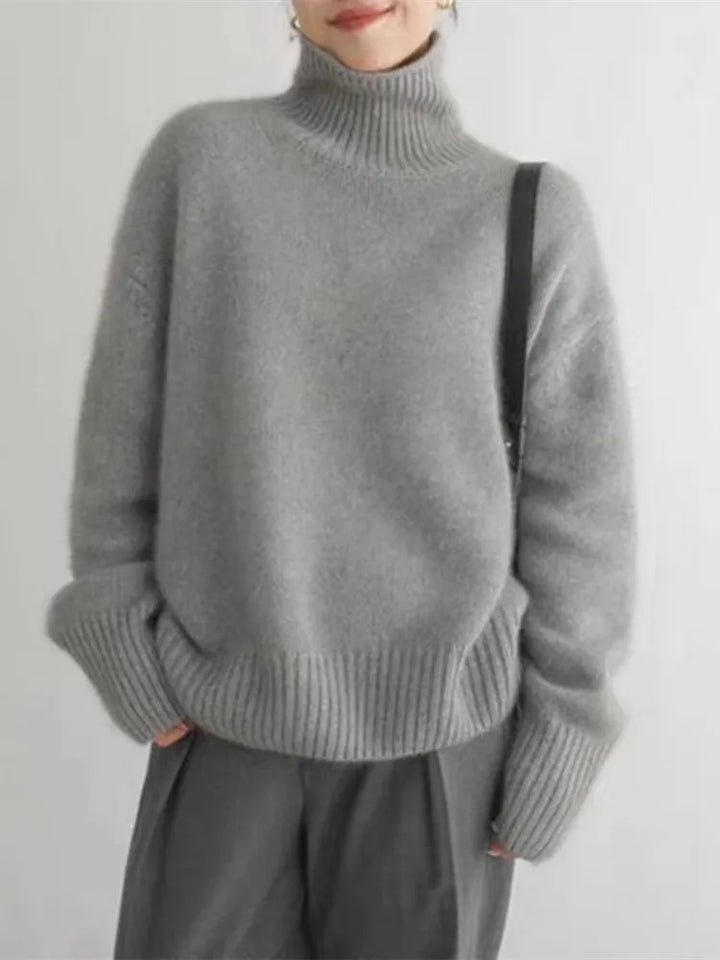 Moderner Damen Rollkragen-Strickpullover, vielseitig kombinierbar für Wintermode und elegante Casual-Looks.