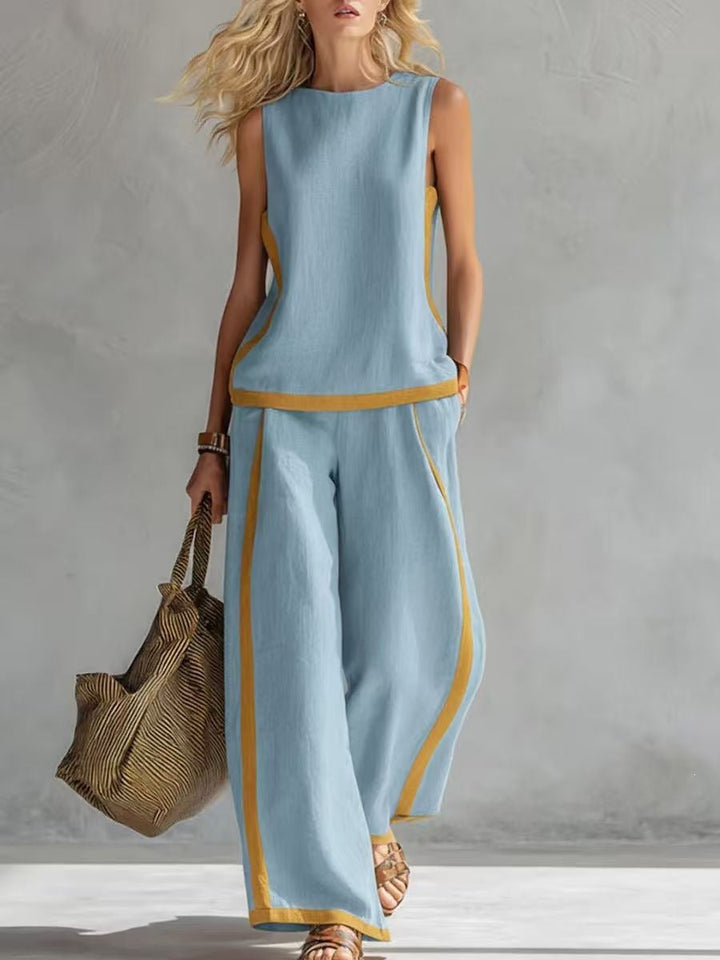Femininer Sommer-Look: Damen Zweiteiler mit ärmellosem Oberteil und modischer weitem Beinhose.