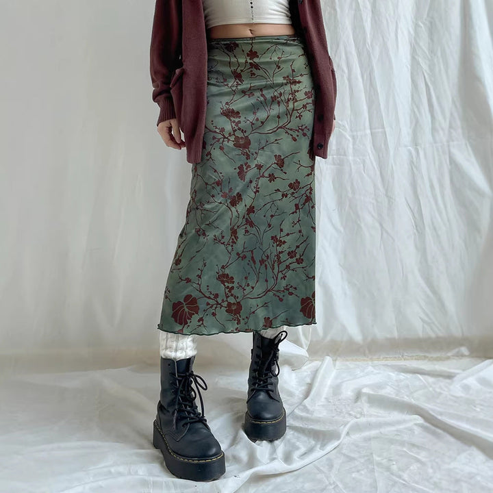 Grüner Damen Maxirock mit lebhaftem floralem Druck und elegantem Schnitt, ein Must-have für frühlingshafte Damenmode.