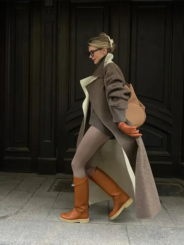 Hochwertiger Damen Wollmantel, langer Schnitt für Herbst & Winter. Elegante, bequeme Oberbekleidung mit Stil.