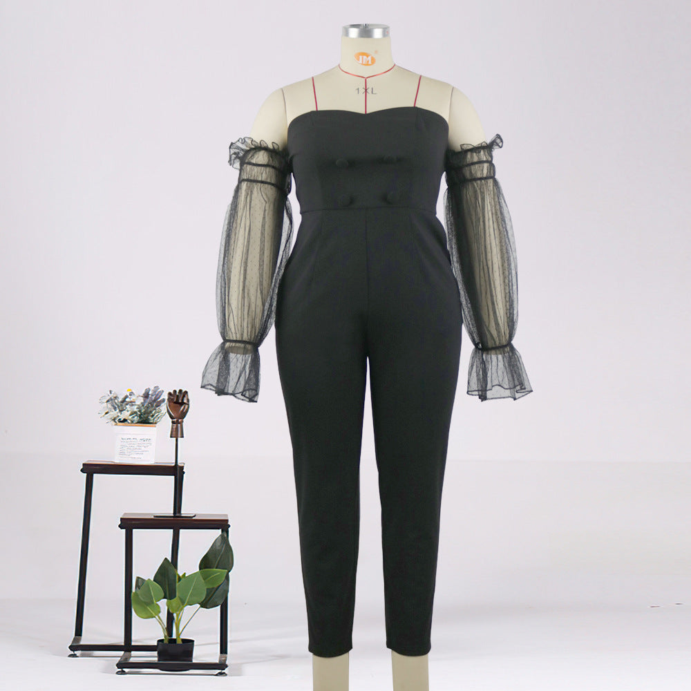 Schwarzer Damen Jumpsuit mit stilvollen transparenten Puffärmeln, perfekt für festliche Anlässe & Party Outfits.
