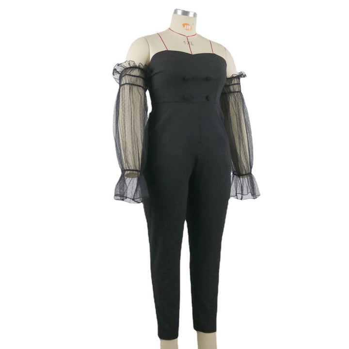 Stilvoller Abend Jumpsuit für Damen: Schwarzer Einteiler mit transparenten Puffärmeln, ideal für festliche Events.