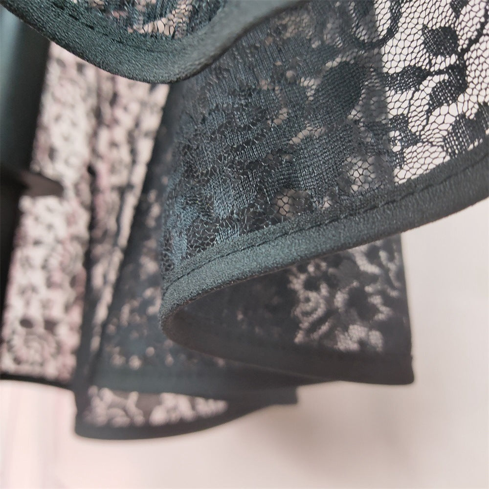 Schwarzer Midirock für Damen, eleganter Wickelstil mit zartem Spitzenbesatz, vielseitig kombinierbar.