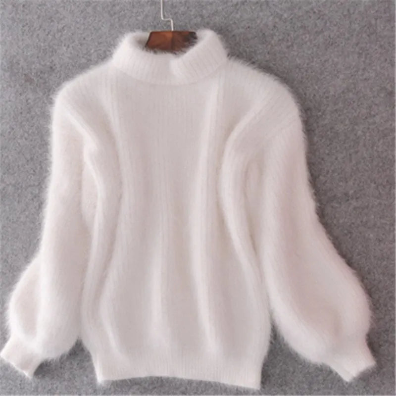 Nahaufnahme eines Damen Strickpullovers. Detaillierte Stricktextur eines warmen Winterpullovers für Frauen.