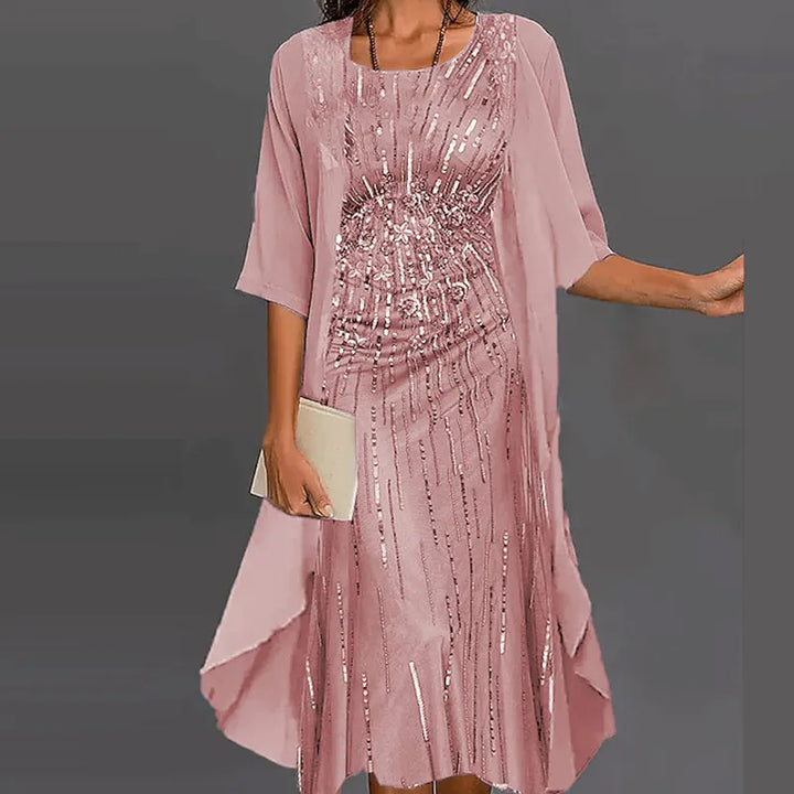 Feminin bedrucktes Damenkleid, elegant und stilvoll. Ideal als Sommerkleid für Freizeit oder besondere festliche Anlässe.