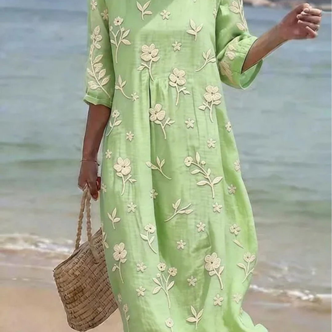 Feminin geblümtes Damen Midikleid für Frühling & Sommer, mit Stickereien, A-Linie und schmeichelhaften Dreiviertelärmeln.