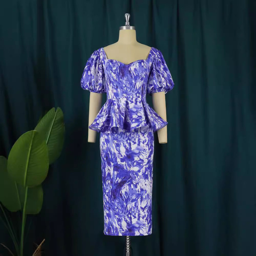 Tailliertes Damen Partykleid in Blau mit eleganten Puffärmeln und Midi-Länge für einen raffinierten Look.