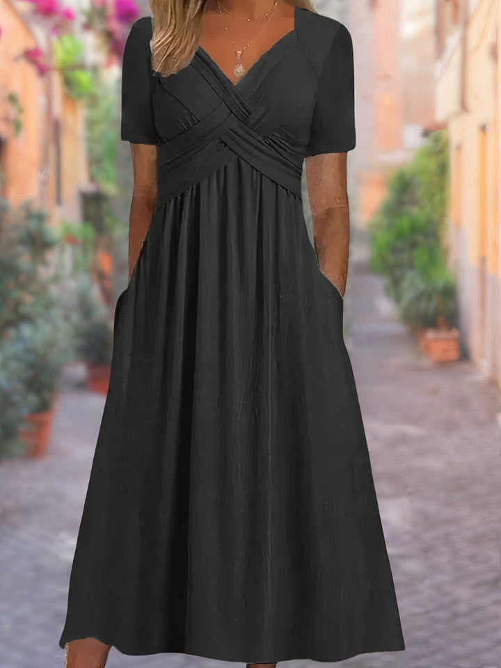 Elegantes Ceola Damen Midikleid in Schwarz mit schmeichelnder Bauchbedeckung, perfekt für festliche Anlässe und Büroalltag.
