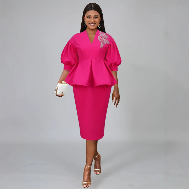 Elegantes Damen A-Linien Kleid mit Puffärmeln, V-Ausschnitt & floralem Muster für festliche Anlässe.