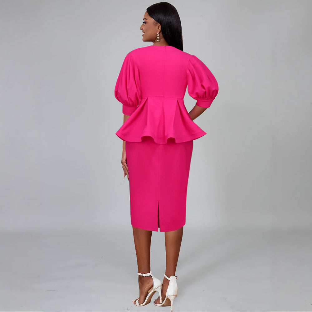 Schickes Sommerkleid im A-Linien-Schnitt für Damen, mit Puffärmeln & floralen Akzenten, ideal für Partys.
