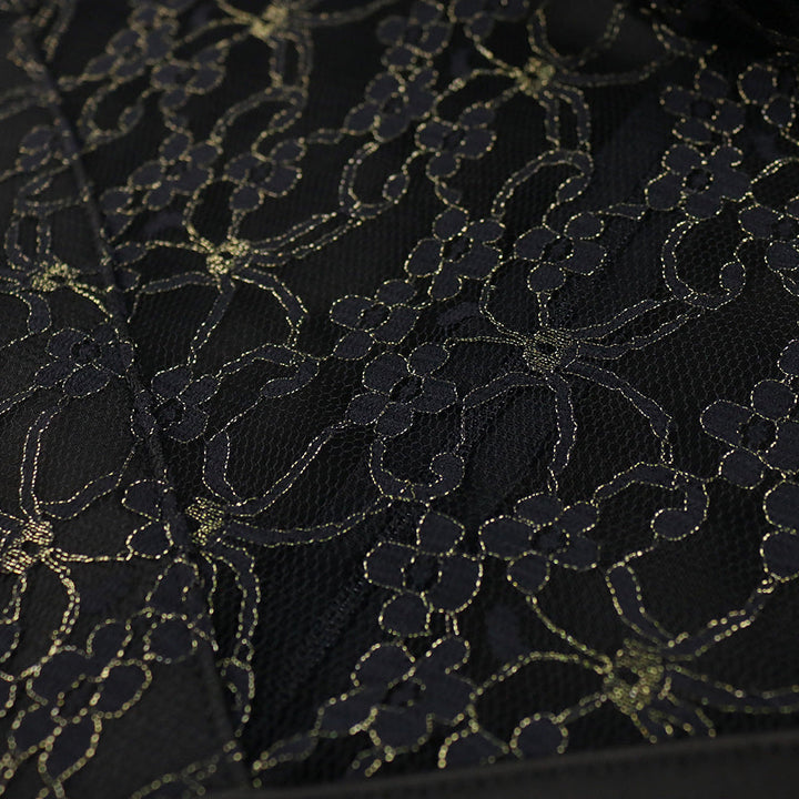 Rückenansicht des festlichen Damen Spitzen Abendkleides, elegant fallend mit asymmetrischem Saum, schwarz.