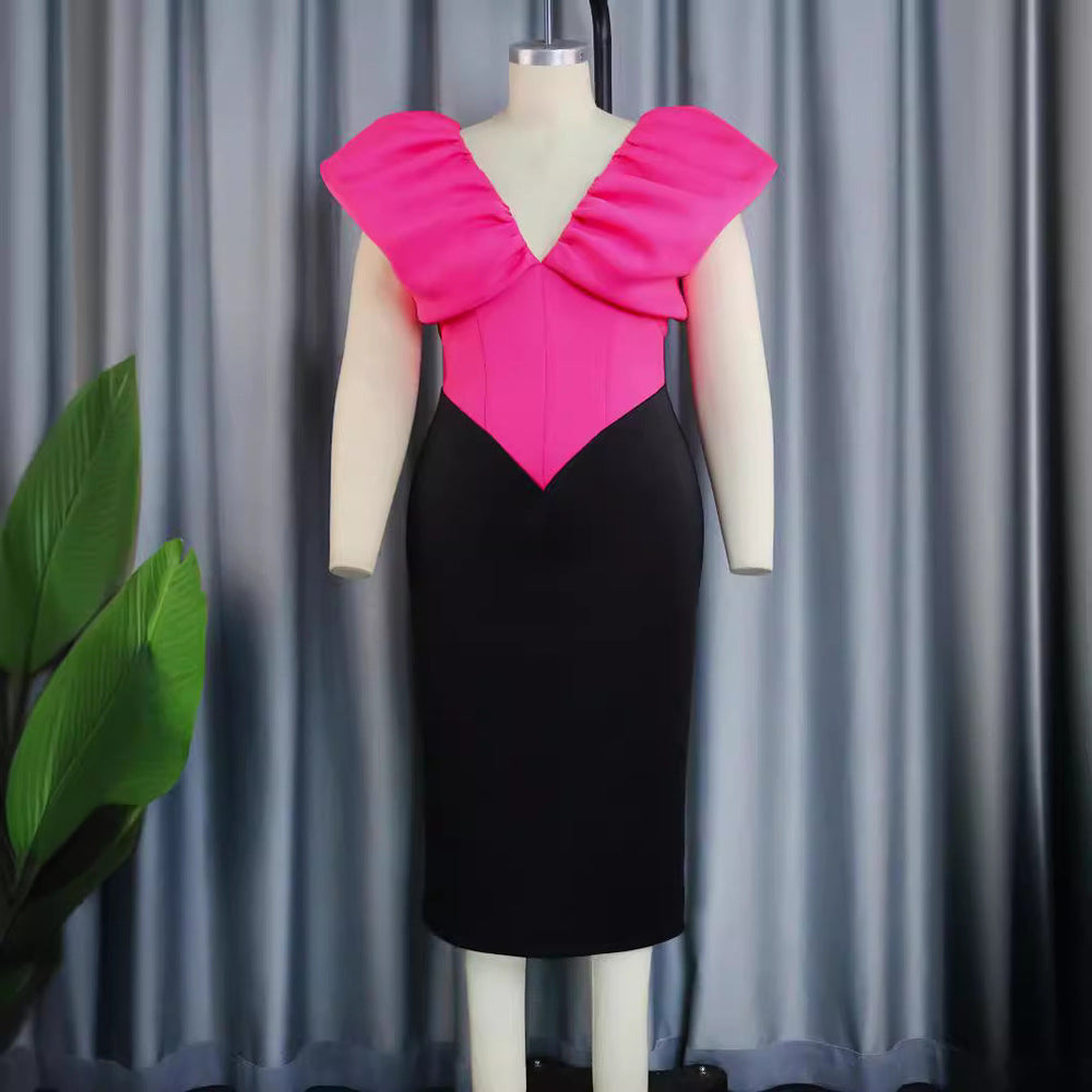 Festliches Damen Cocktailkleid in leuchtendem Magenta mit extravaganter Rüschendekoration am Oberteil.